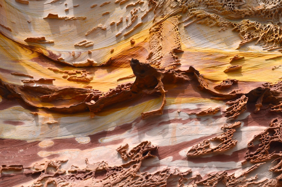 Above: Menorca's unique geological layering on the north side of the island, including slate, sandstone, volcanic rock, and red clay.